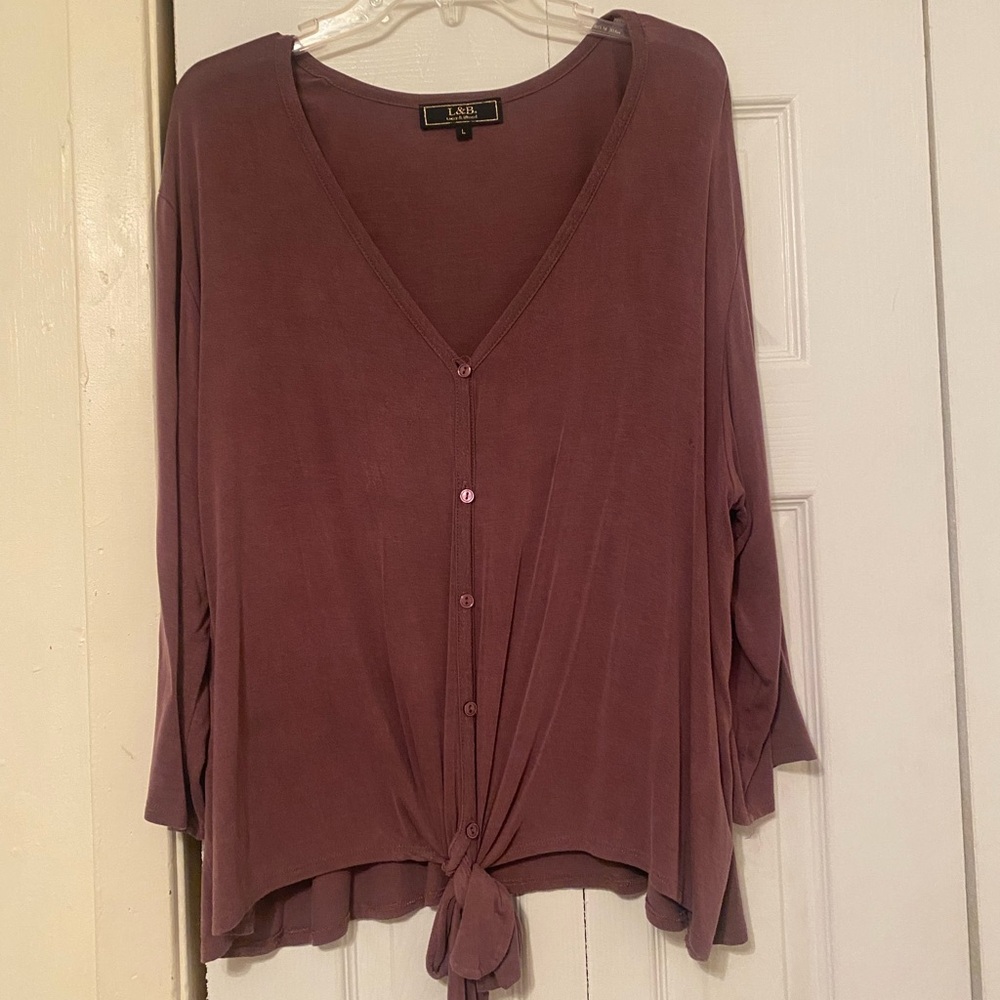 Dark purple shirt that ties in the front.